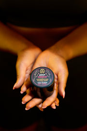 Grip Goddess cream jar cupped in both hands